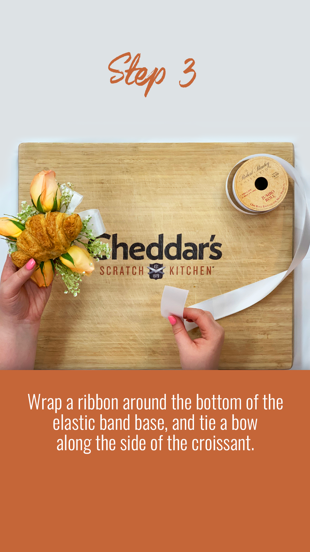 Step 3: Wrap a ribbon around the elastic band base and tie a bow.