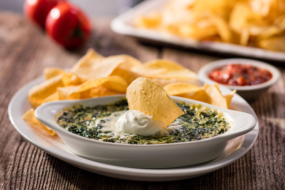 Visit Cheddar's Scratch Kitchen and take a scoop of our flavorful Santa Fe Spinach Dip with house-fried tortilla chips.