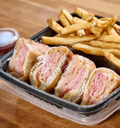 Order Cheddar's Monte Cristo sandwich with a side of fries for delivery today!