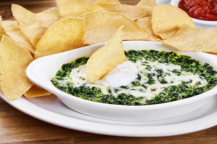 Visit Cheddar's Scratch Kitchen and take a scoop of our flavorful Santa Fe Spinach Dip with house-fried tortilla chips.