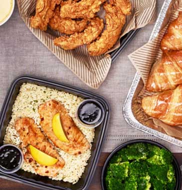 At Cheddar's, get a family bundle of chicken tenders, grilled salmon, and choice of two sides.