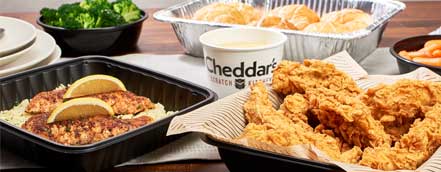 A table filled with delicious options from Cheddar's Scratch Kitcken Family Bundles menu.
