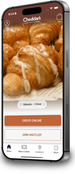 Image of a phone showcasing the Cheddar's app.
