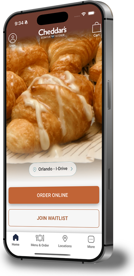 Image of a phone showcasing the Cheddar's app.