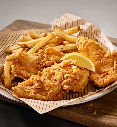 At Cheddar's, enjoy your choice of Fish and Chips, Cajun Chicken Bowl, or Homemade Chicken Pot Pie.